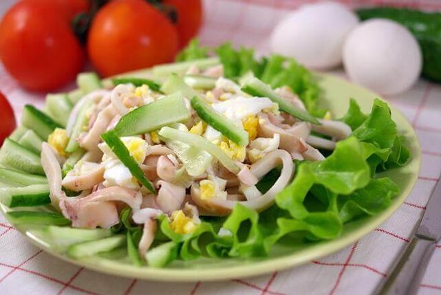 Salad of calamari with eggs and cucumber in a low carbohydrate diet